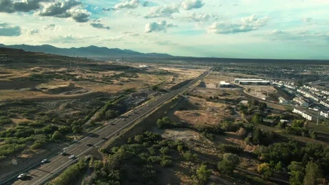 BEAUTIFUL CLOSE TO SUNSET DRONE VIEW FLYING PARALLEL TO REDWOOD ROAD IN Stock Footage 161220633
