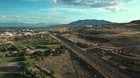 BEAUTIFUL CLOSE TO SUNSET DRONE VIEW FLYING PARALLEL TO REDWOOD ROAD IN Stock Footage 161220640