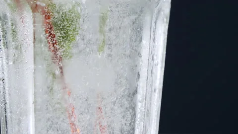 Beautiful close-up of thirst-quenching soft drink, drops falling, juice Stock Footage 178476693