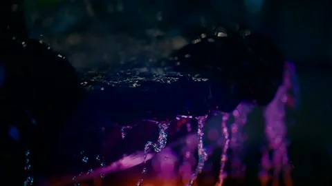 A beautiful close-up video of water falling in a fountain Stock Footage 229479466