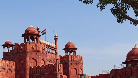 Beautiful close-up view of the Red Fort with swaying indian flag, Delhi, India Stock Footage 295504601