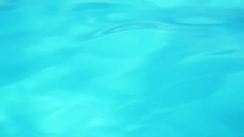 Beautiful closeup summer background of a clear blue sloppy water in a cool Video stock 114779457