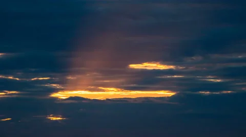 The beautiful cloud flow against the background of sunset. Time lapse Stock Footage 64102843