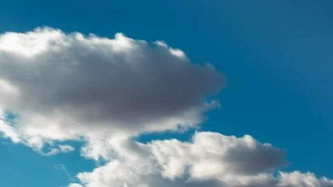 Beautiful cloud formation and clear blue turquoise sky Stock Footage 178027094