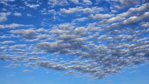 Beautiful cloud patterns formed in a summer afternoon Stock Photos