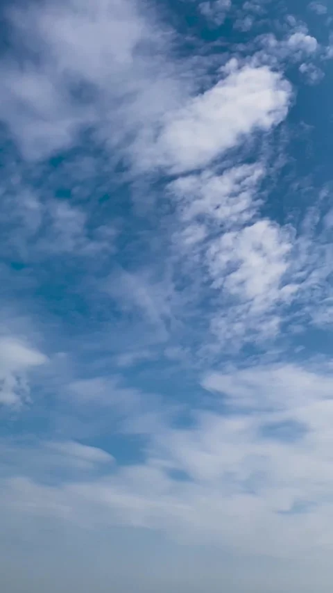 Beautiful cloud scape with fluffy white clouds with blue sky. Видео 301572356