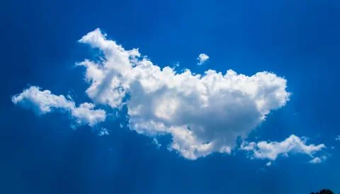 Beautiful Cloud in the Shape of a Dragon displaying Tyndall effect, 5K Stock Photos