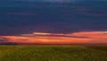 The beautiful cloud stream above a green field 4k or 4k+ Resolution