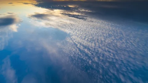 The beautiful cloud stream on the sunrise background. time lapse Video stock 112597593