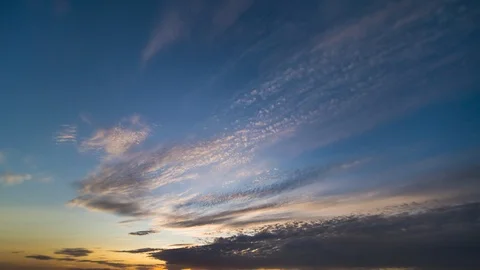 The beautiful cloud stream on the sunrise background. time lapse Video stock 112598007