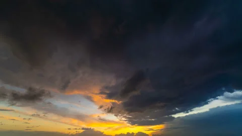 The beautiful cloud stream on the sunset background. time lapse Stock Footage 110436956