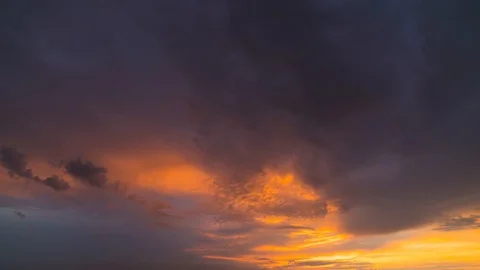 The beautiful cloud stream on the sunset background. time lapse Stock Footage 112594241