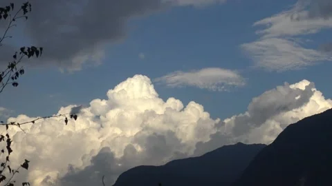 Beautiful cloud timelapse over mountains with paragliders Stock Footage 159075649