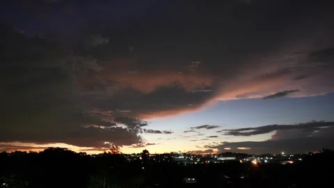 A beautiful cloudlapse of a stunning cloud bank catching the last rays Stock Footage 263770765