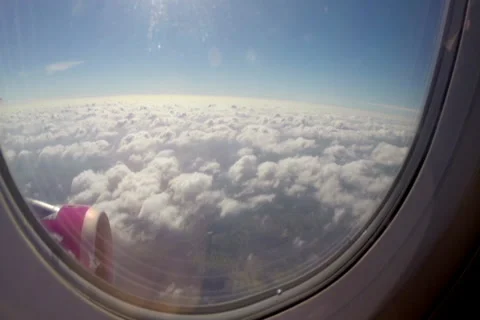 Beautiful clouds airplane passenger point of view turbine height, click for HD Stock Footage 43967332