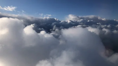 Beautiful Clouds from Airplane Window in 4K Stock Footage 129486915