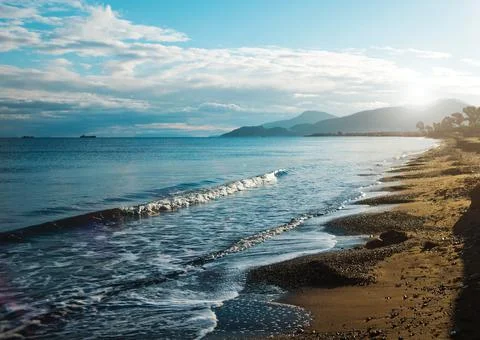 Beautiful clouds and mountains next to the sea. seascape. coast of Turkey and Stock Photos