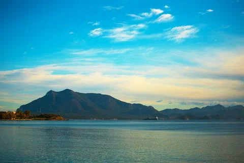 Beautiful clouds and mountains next to the sea. seascape. coast of Turkey and Stock Photos