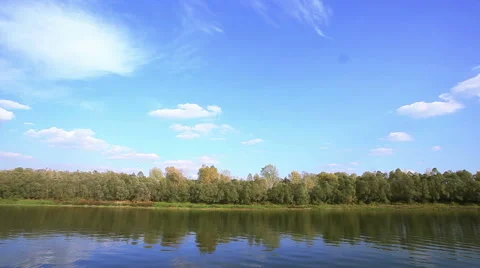 Beautiful clouds  and river.  Time lapse landscape Stock Footage 43015317
