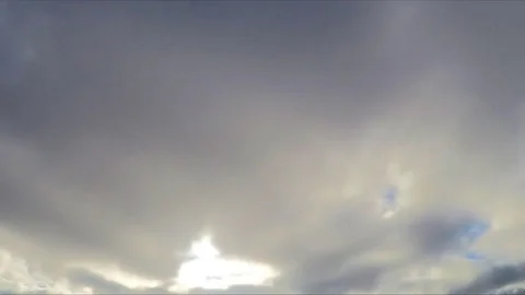 Beautiful clouds and sun in blue sky timelapse Stock Footage 82048746