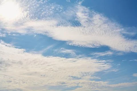 Beautiful clouds on a blue sky background. Stock Photos