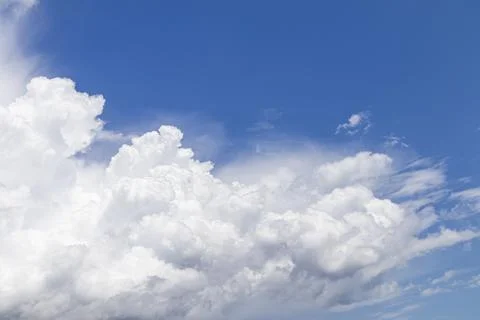 Beautiful clouds on the blue sky as a background Photos
