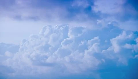 Beautiful clouds in a blue sky, top view. Stock Photos