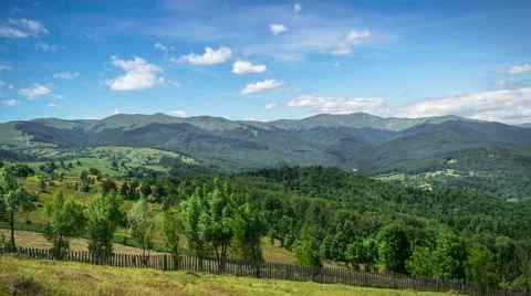 Beautiful Clouds on Blue Sky, View Over Mountain, Timelaps Stock Footage 64954321