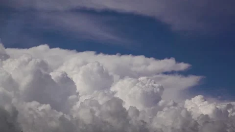 Beautiful clouds. The clouds grow swirl and grow. The weather is changing.  스톡 동영상 132335517