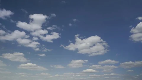 Beautiful clouds in a deep blue sky, meditative relaxing, time lapse Stock Footage 78973131