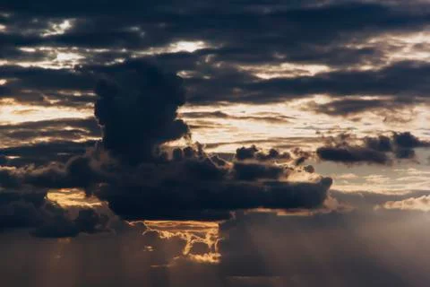 Beautiful clouds in the evening setting sun Stock Photos