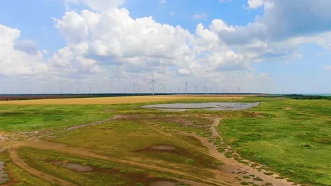 Beautiful clouds in the field above wind farms in Ukraine Stock Footage 156522589