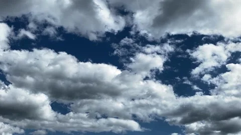 Beautiful clouds float across the blue sky. Stock Footage 194452578