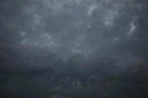 Beautiful clouds float across the blue sky. Stock Photos
