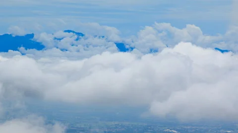 Beautiful Clouds Floating On Mountain Valley 4K Time Lapse (pan right) Stock Footage 65321692