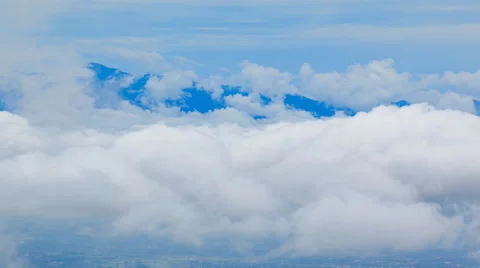 Beautiful Clouds Floating On Mountain Valley 4K Time Lapse (pan left) Stock Footage 65322312