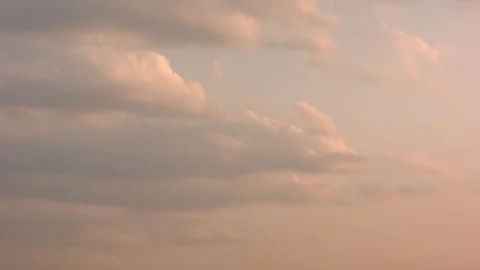 Beautiful clouds flowing in the sunset, time laps. Stock Footage 88436648