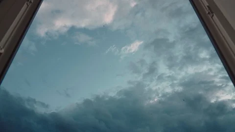 Beautiful clouds fly outside the window Stock Footage 129809691