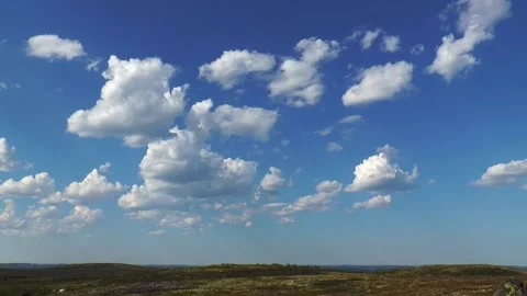 Beautiful clouds fly over the Stock Footage 317183798