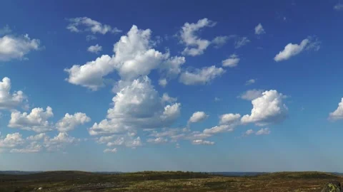 Beautiful clouds fly over the Stock Footage 317183808
