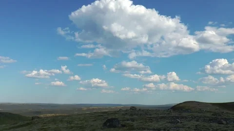 Beautiful clouds fly over the Stock Footage 317183832