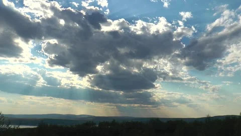 Beautiful clouds fly over the Stock Footage 317183839