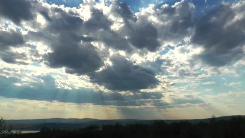 Beautiful clouds fly over the Stock Footage 317183854