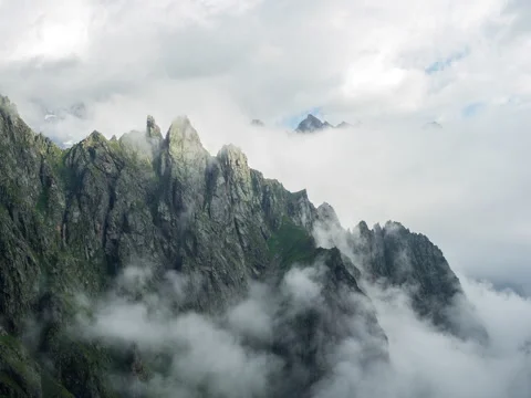 Beautiful clouds in mountains 5k timelapse Stock Footage 71669839