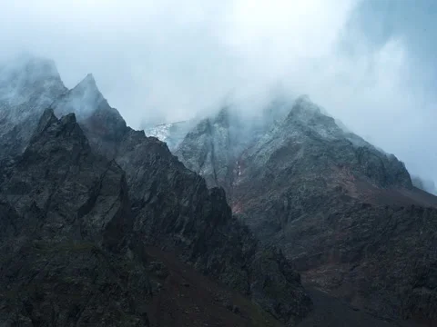 Beautiful clouds in mountains timelapse Stock Footage 71668203