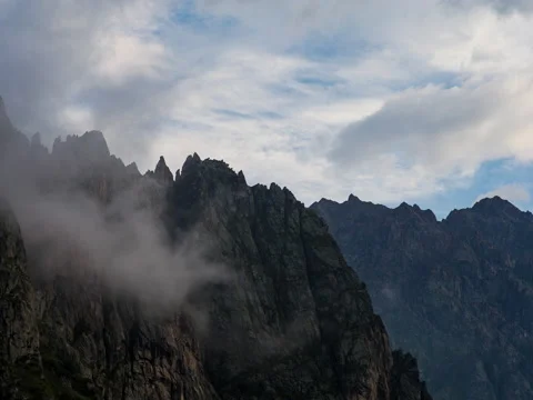 Beautiful clouds in mountains timelapse Stock Footage 71668675
