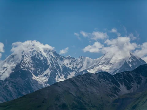 Beautiful clouds in mountains timelapse Stock Footage 71680010