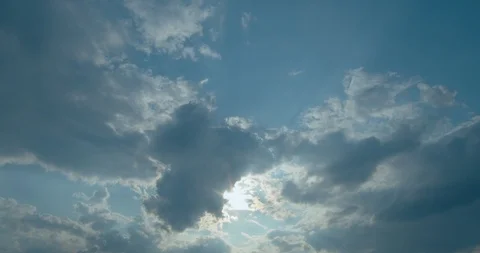 Beautiful clouds move across the blue sky Stock Footage 113633016
