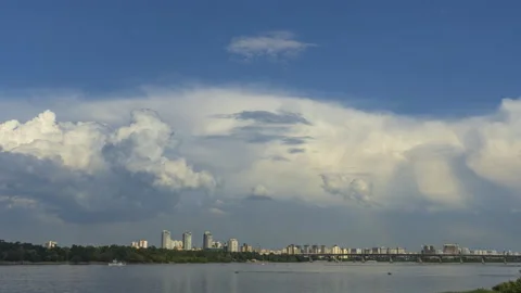 Beautiful clouds movement above the left bank of Kyiv, Ukraine / 4k time-lapse Stock Footage 205117935