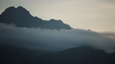 Beautiful clouds moving across mountain in South East Asia Stock Footage 117189213